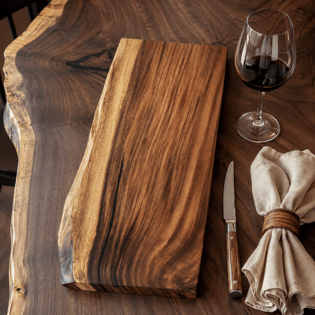 Handcrafted Monkey Pod serving board with optional epoxy.