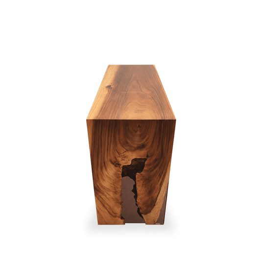 Waterfall Monkey Pod entryway console table with amber epoxy detailing on one leg.