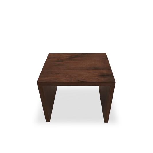 Waterfall walnut side table with seamless solid wood construction