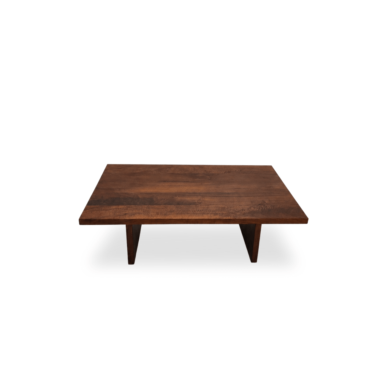 Handcrafted walnut coffee table featuring a straight-edge tabletop and architectural base