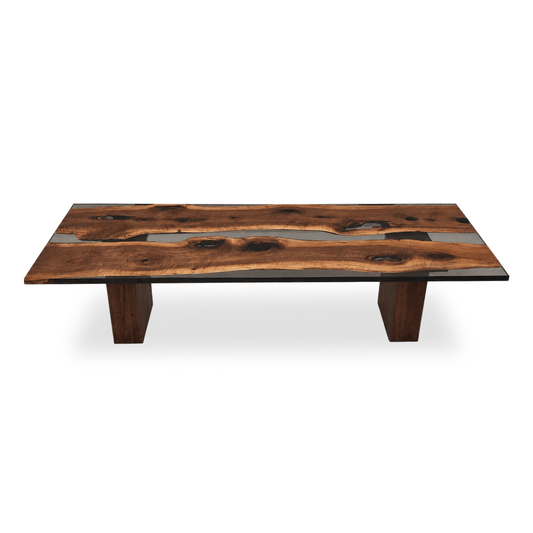 Select walnut dining table with gray epoxy river and solid wooden base