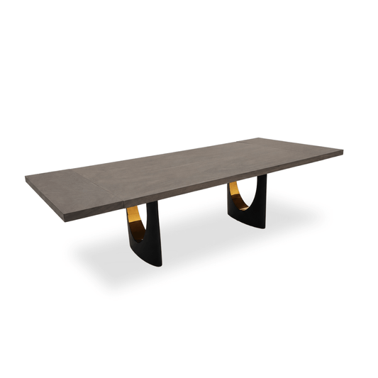 Vault bleached Monkey Pod extendable dining table with arched dual-tone metal base.