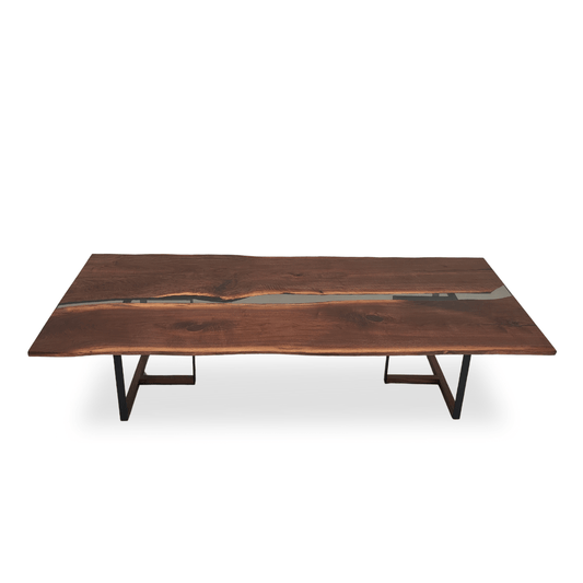 Tuco walnut dining table with transparent gray epoxy river and T-shaped steel legs with walnut inserts
