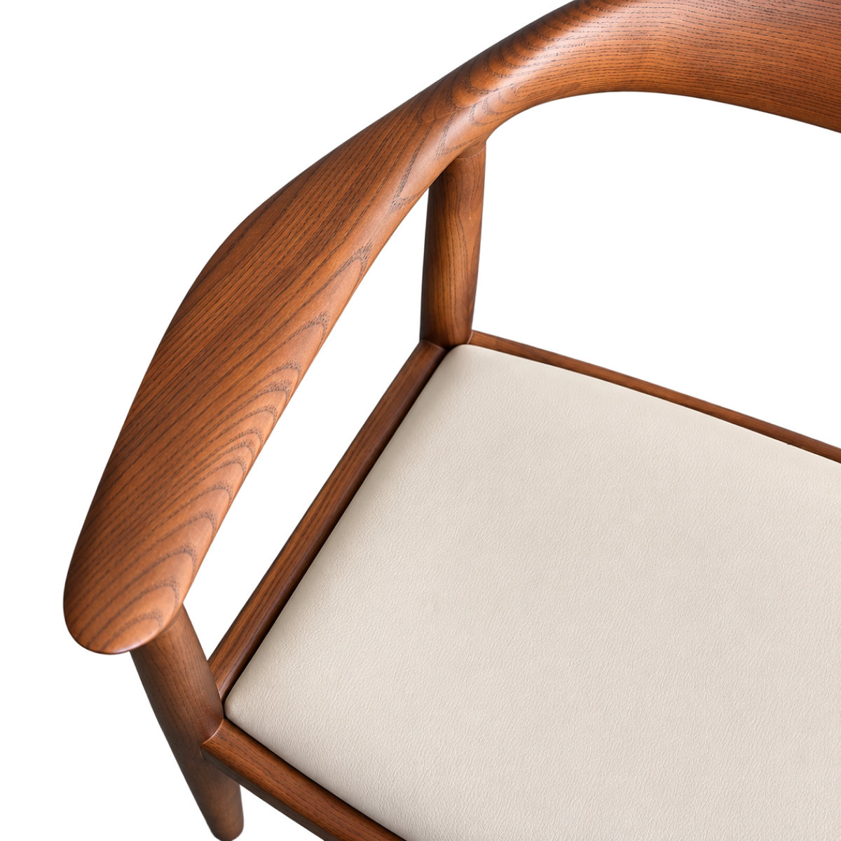 Wooden backrest of Kennedy dining armchair with walnut-colored hardwood frame