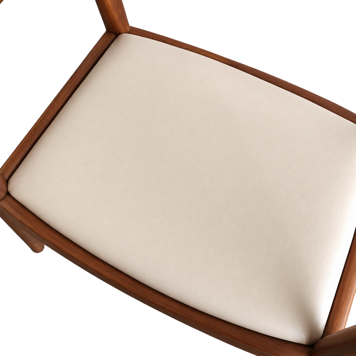 Taupe leather upholstered seat on Kennedy dining chair