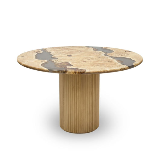 Wooden table with a round top and cylindrical base on a white background